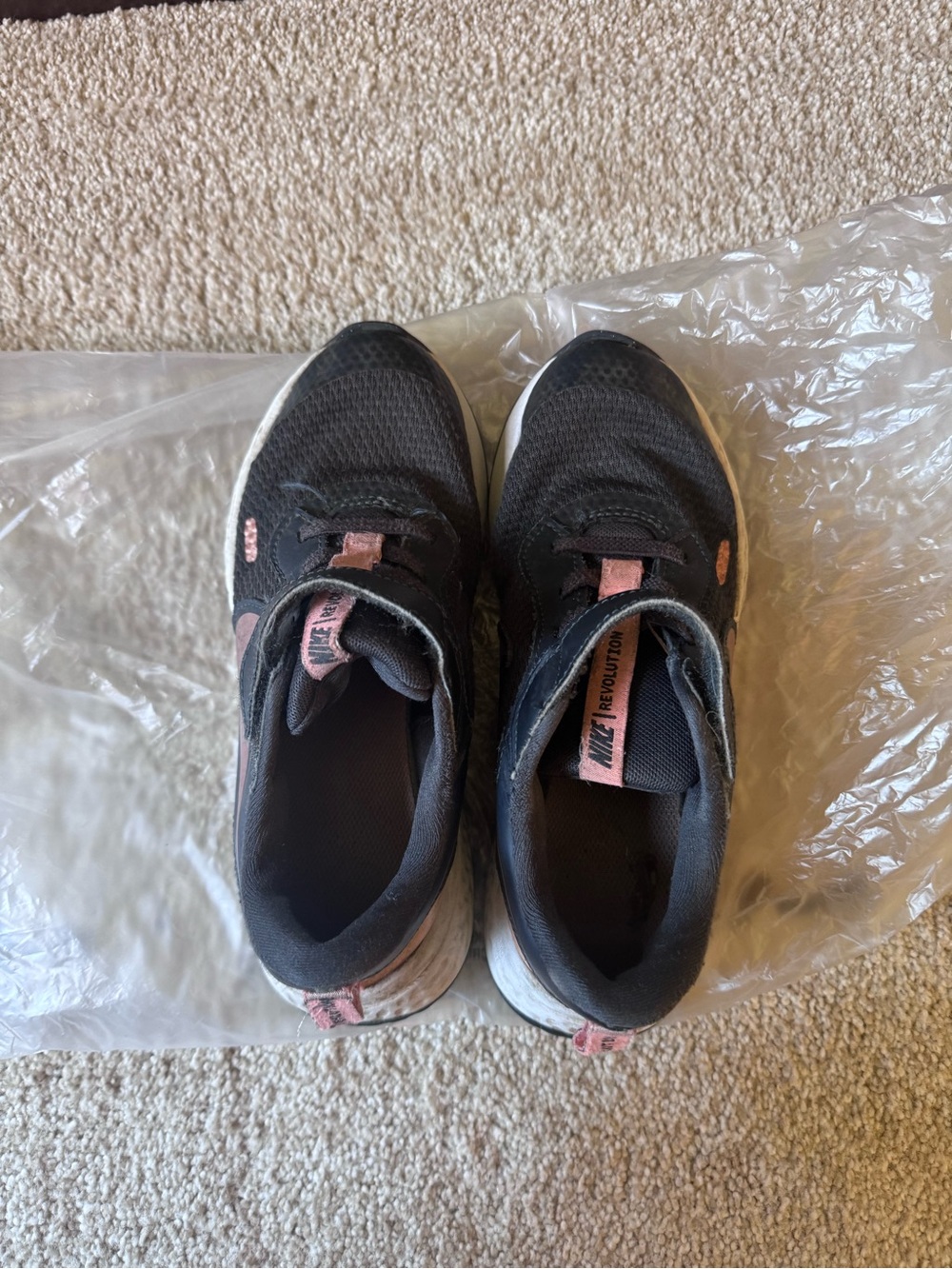 Nike Kids Black and Pink Slip-On Sneakers